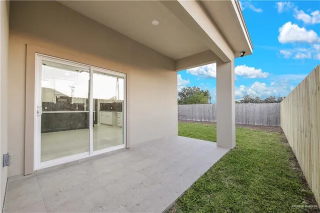 a view of a backyard with garden