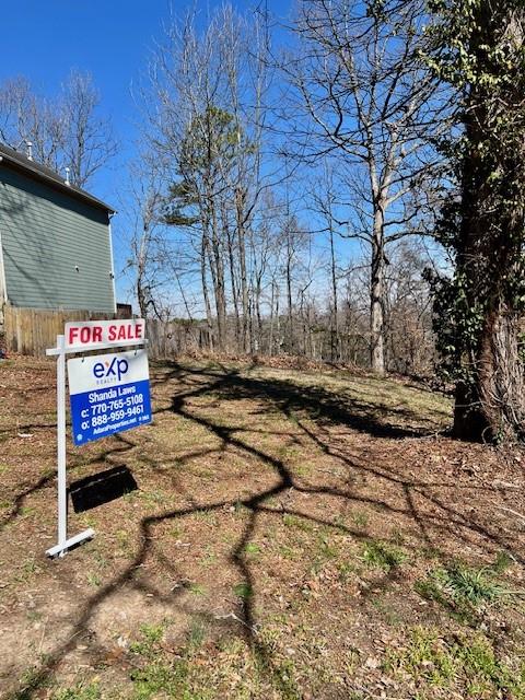 0 Rome Drive Northwest Atlanta, GA 30314 - Photo 7 of 8 a view of street with wooden fence