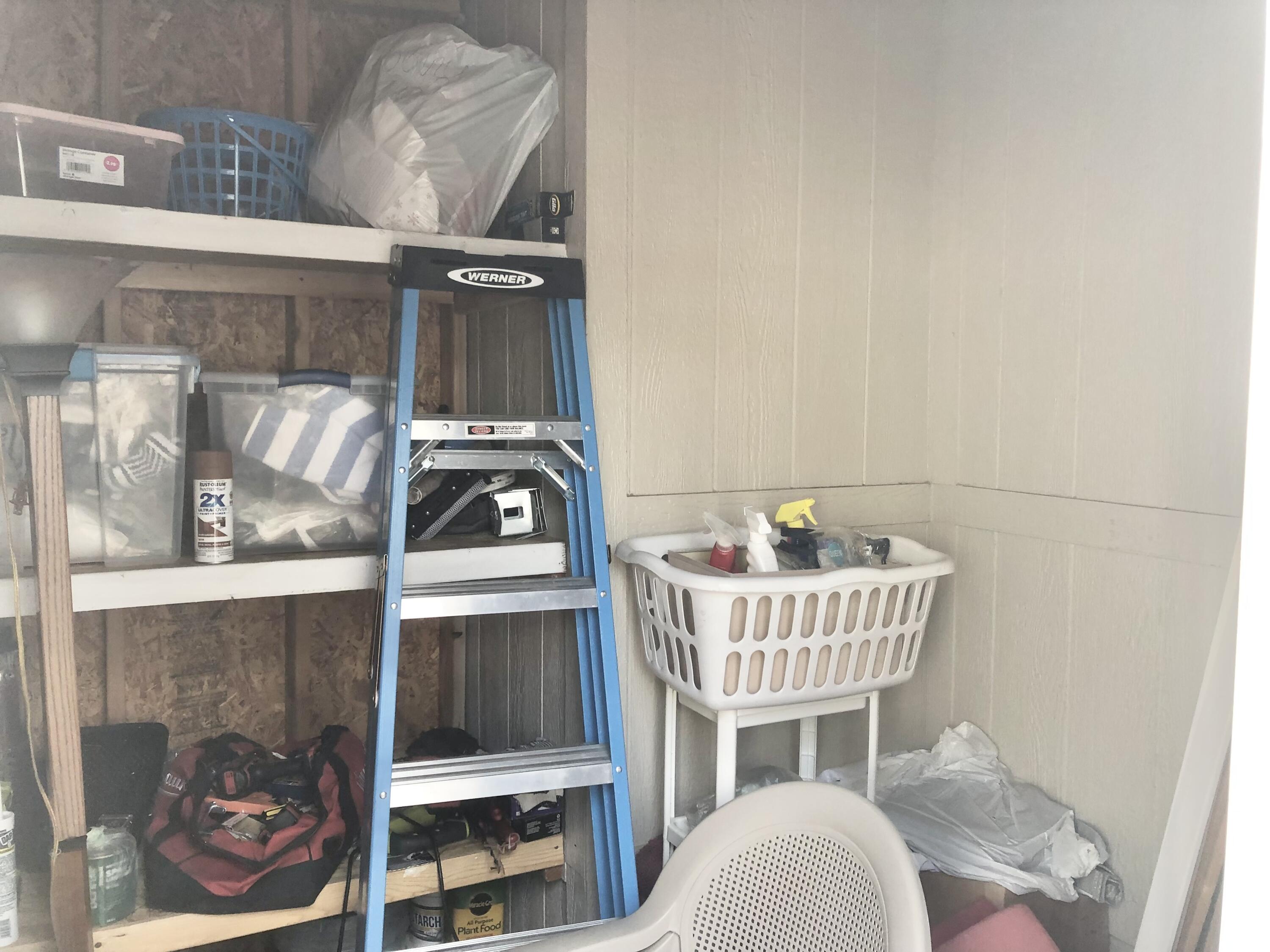 74711 Dillon Road Desert Hot Springs, CA 92241 - Photo 16 of 44 a view of a bedroom with a bed