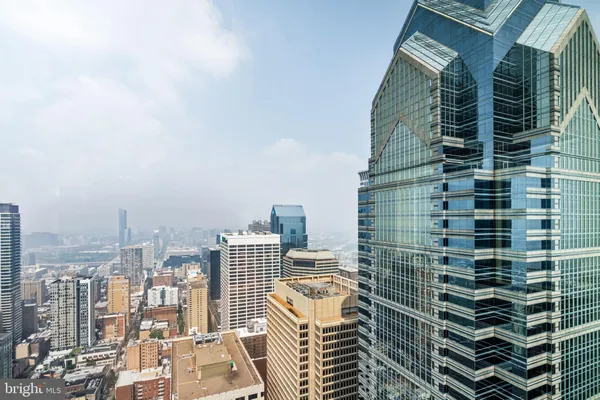 a view of a city with tall buildings