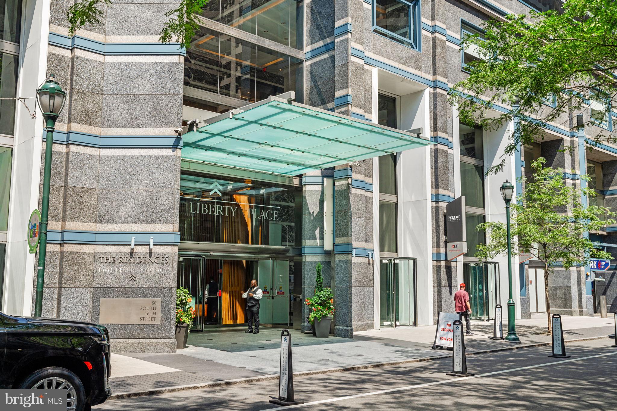 50 South 16th Street, Unit 4304 Philadelphia, PA 19103 - Photo 24 of 43 a front view of a building with street