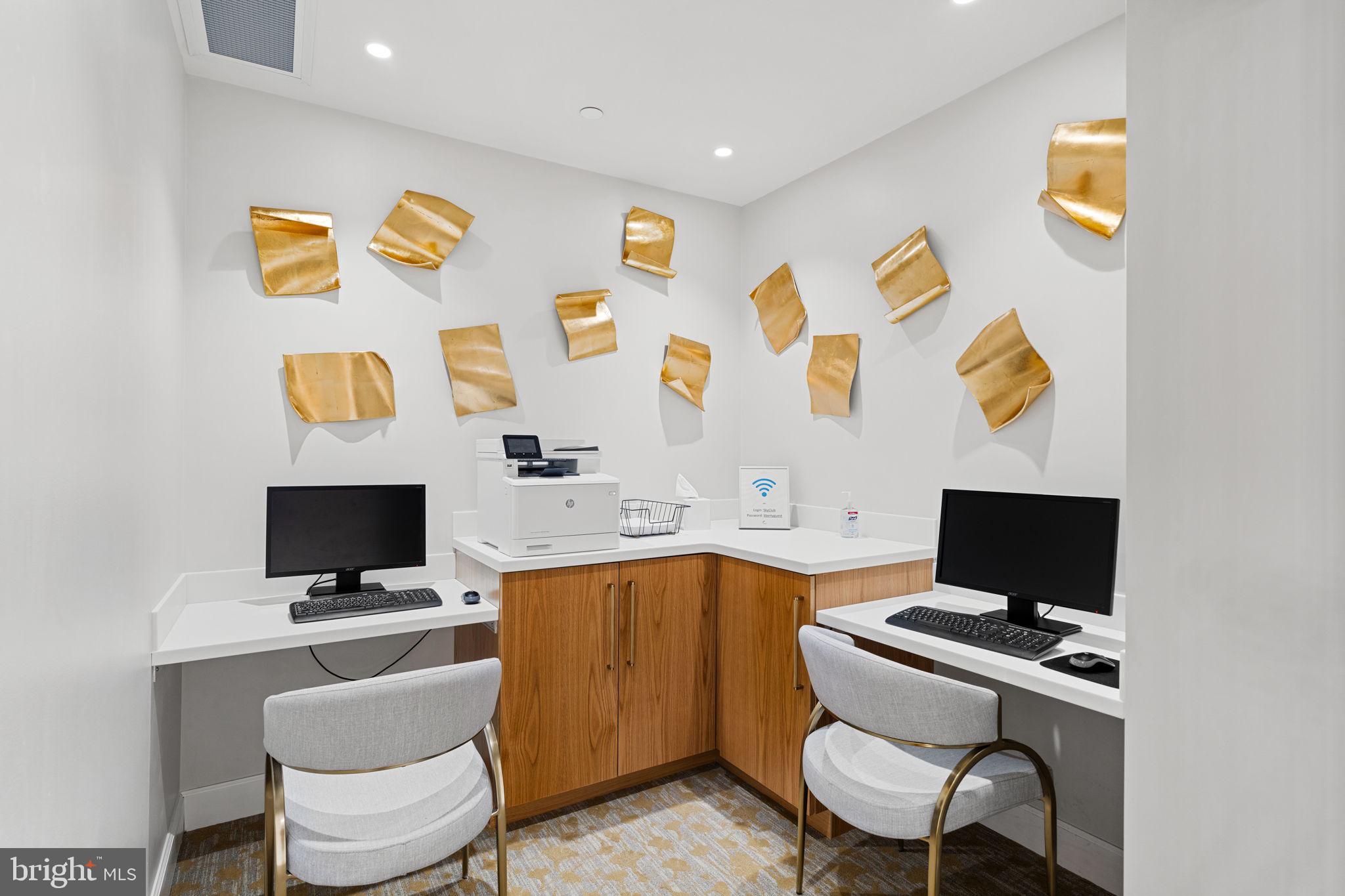 50 South 16th Street, Unit 4304 Philadelphia, PA 19103 - Photo 41 of 43 a workspace with furniture and screen