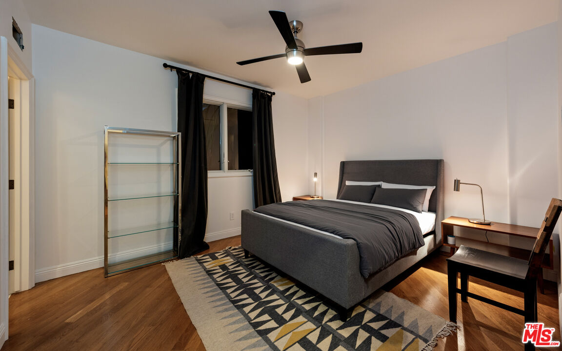 123 Channel Pointe Mall Marina del Rey, CA 90292 - Photo 36 of 75 a bedroom with a bed and wooden floor