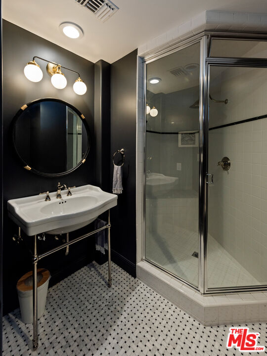 123 Channel Pointe Mall Marina del Rey, CA 90292 - Photo 56 of 75 a bathroom with a sink and a mirror