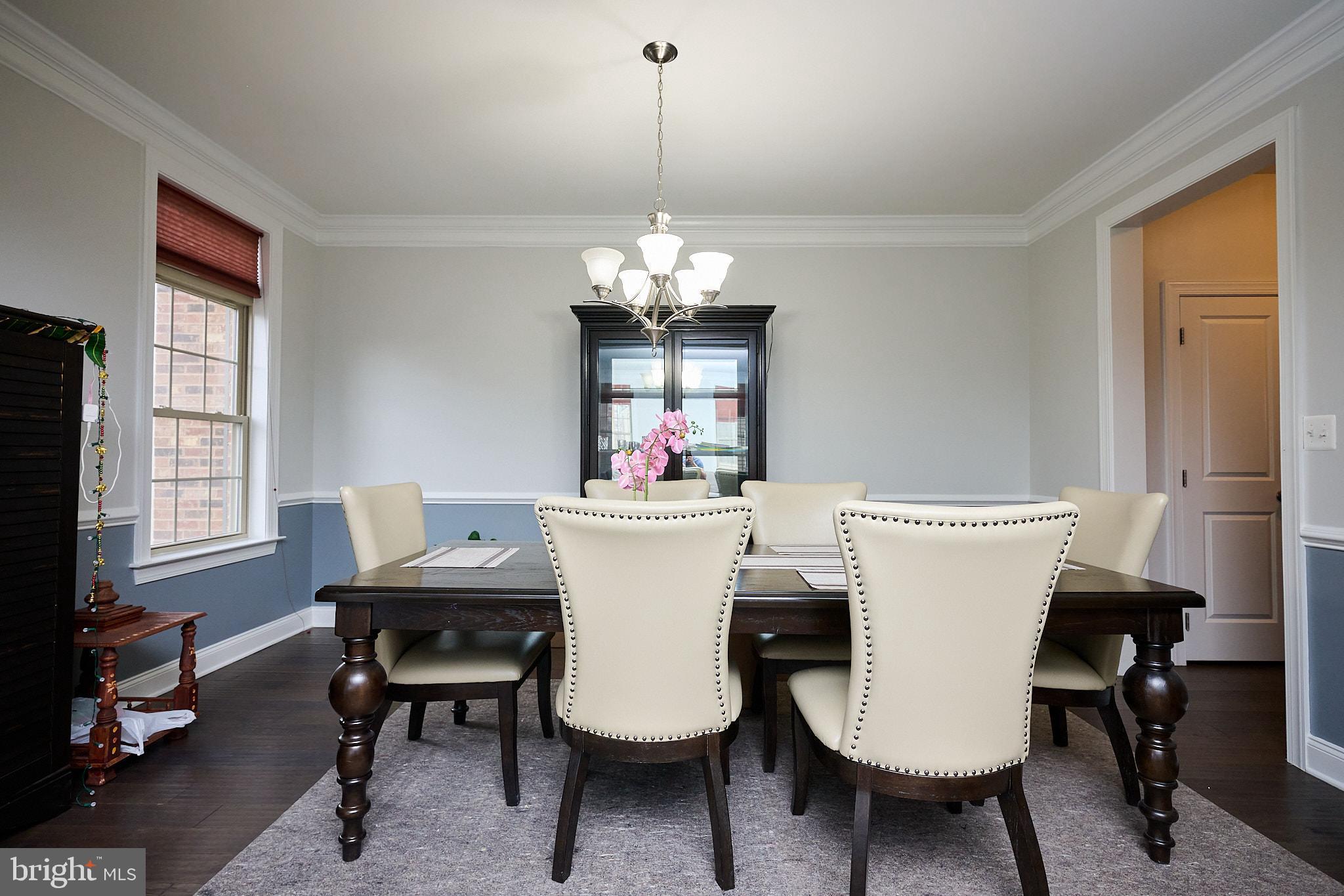 22559 Windsor Locks Square Ashburn, VA 20148 - Photo 16 of 35 a view of a dining room with furniture window and outside view