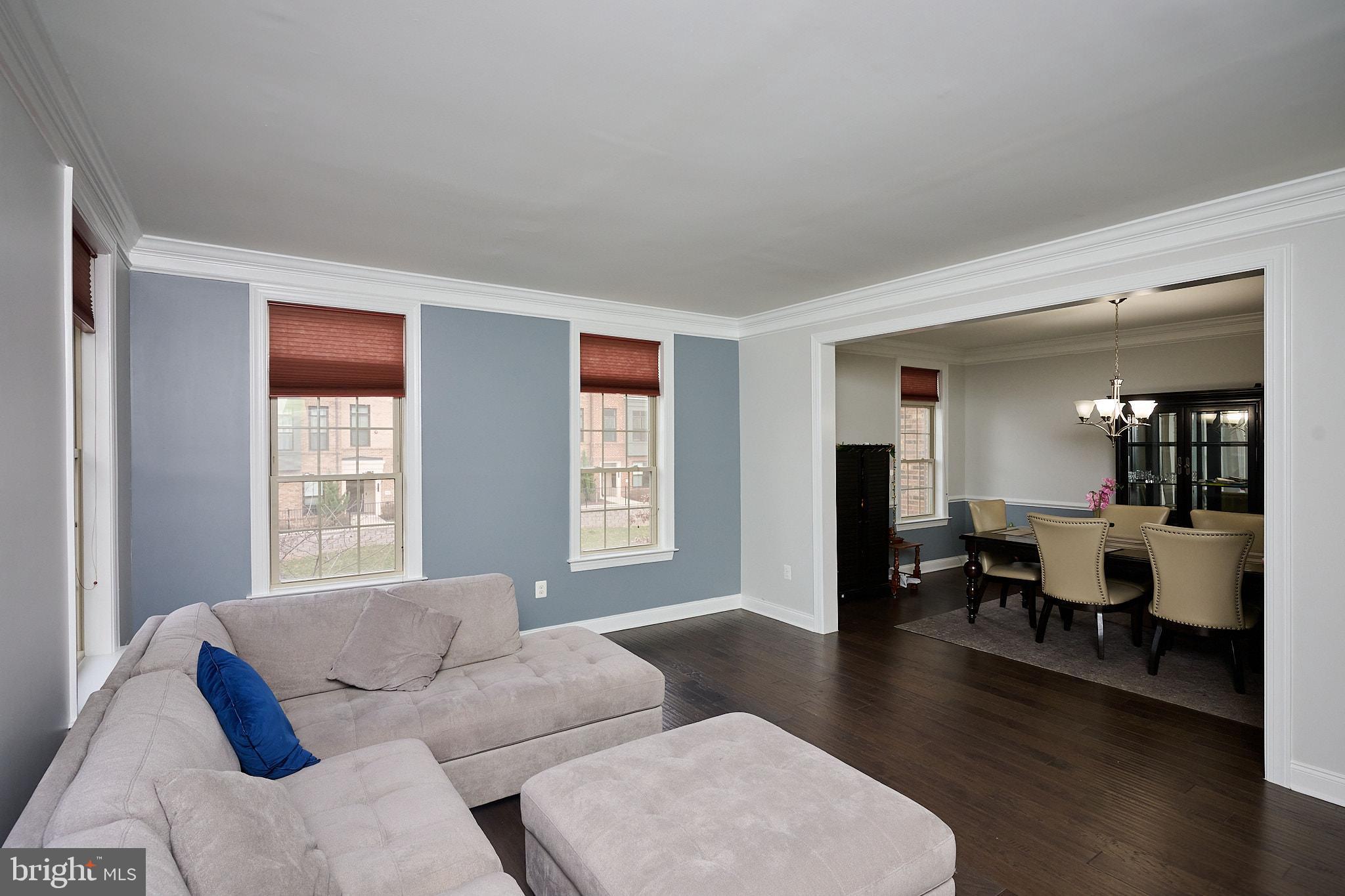 22559 Windsor Locks Square Ashburn, VA 20148 - Photo 19 of 35 a living room with furniture and wooden floor