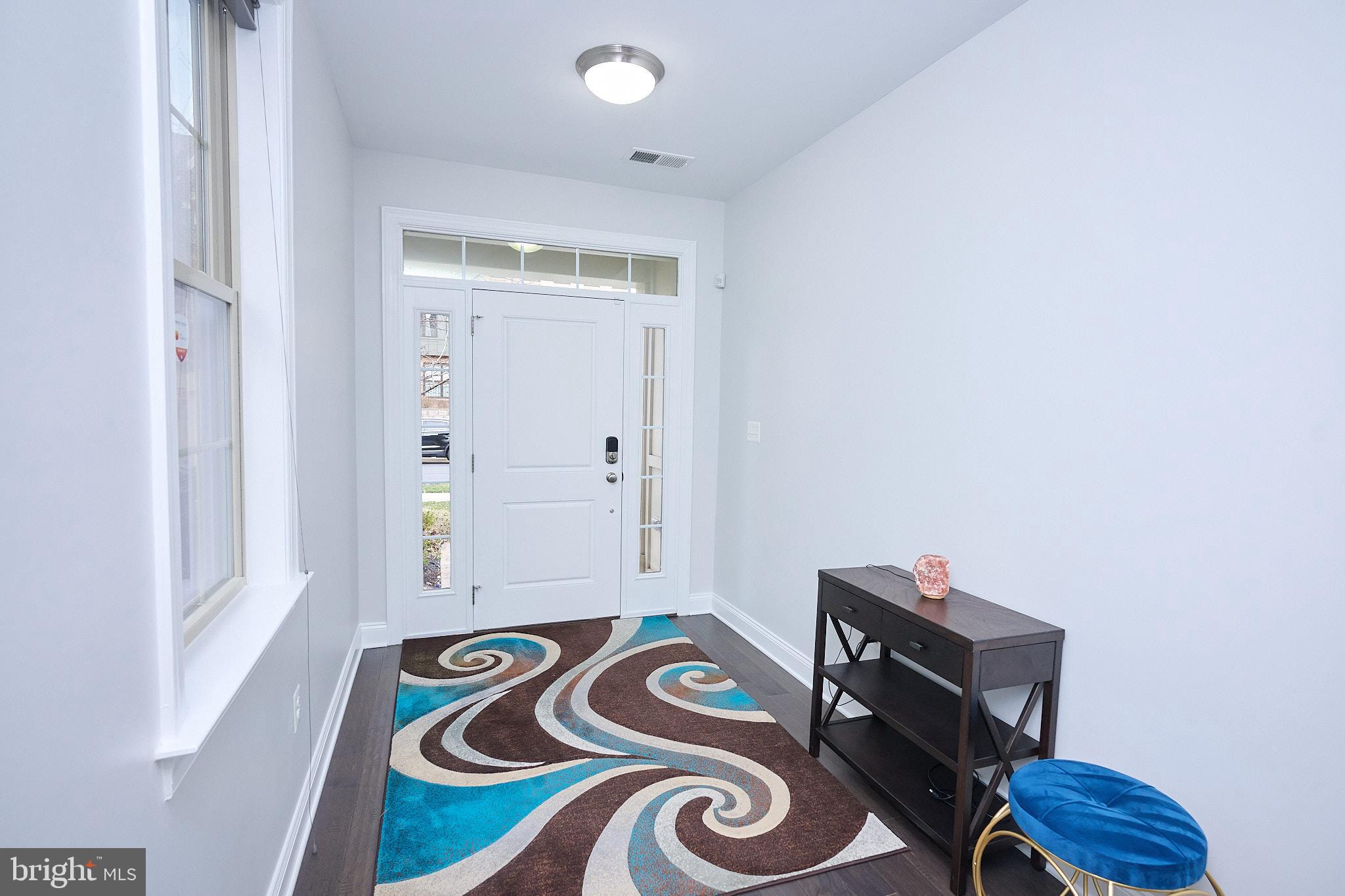 22559 Windsor Locks Square Ashburn, VA 20148 - Photo 3 of 35 a bathroom with a sink and a mirror