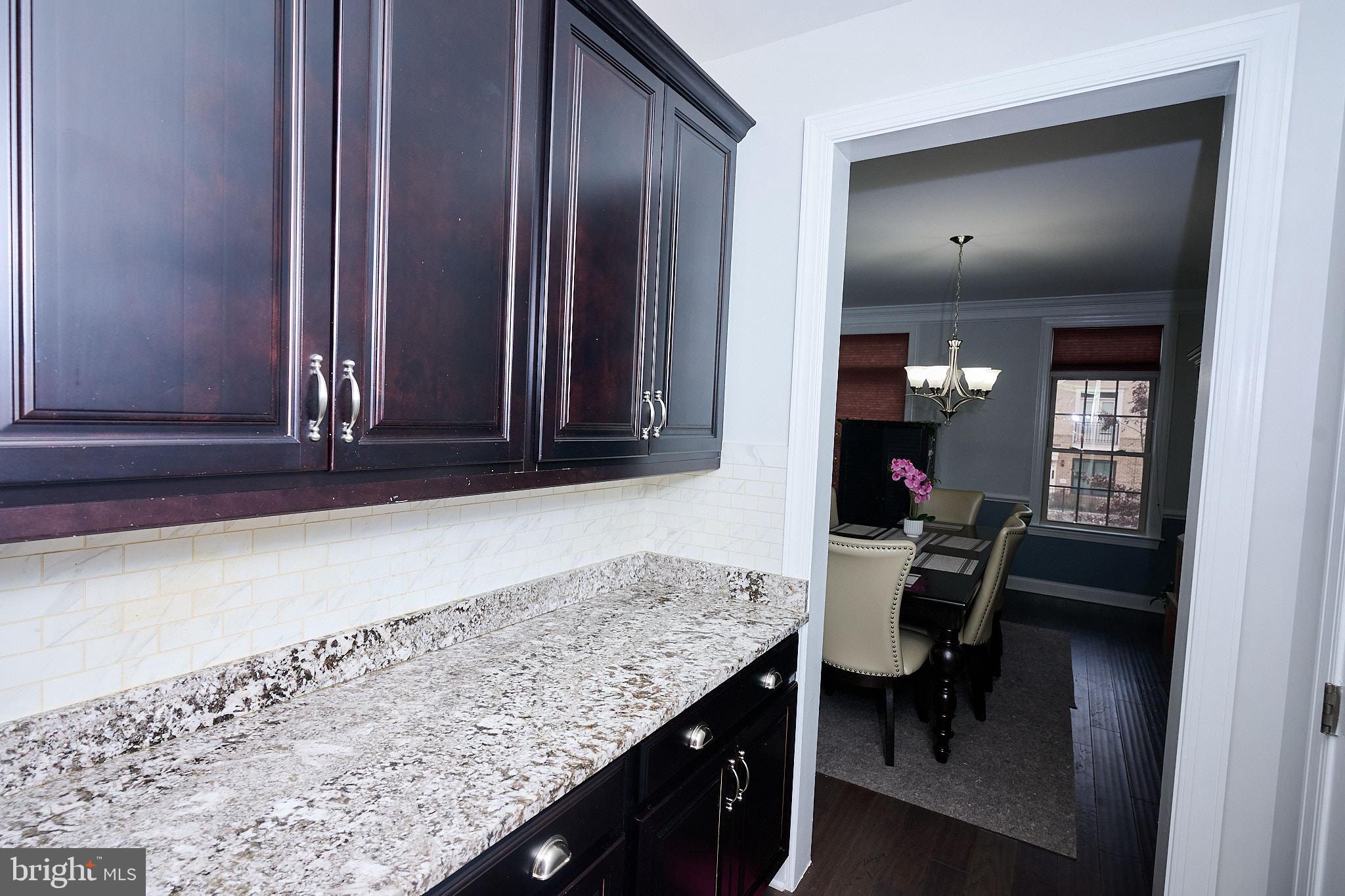 22559 Windsor Locks Square Ashburn, VA 20148 - Photo 7 of 35 an entryway with table and chair