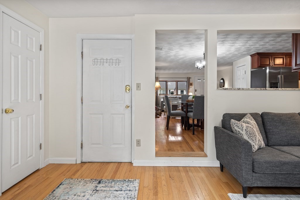 29 Karen Road Wakefield, MA 01880 - Photo 18 of 42 a living room with furniture and a rug