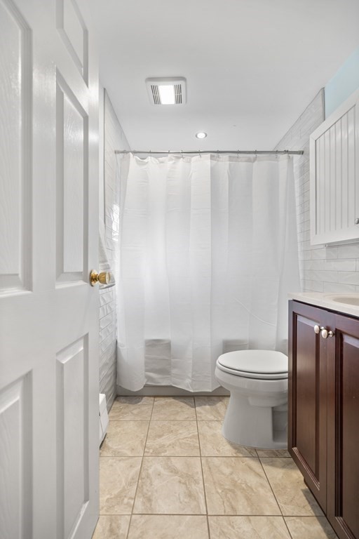29 Karen Road Wakefield, MA 01880 - Photo 20 of 42 a bathroom with a toilet a sink and shower
