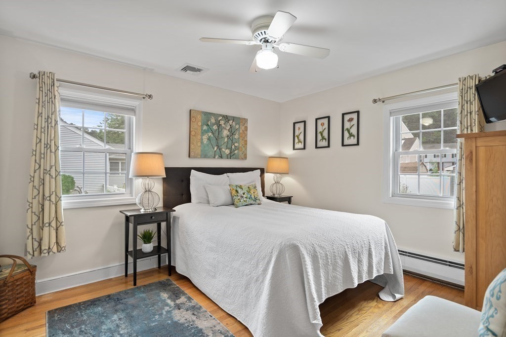 29 Karen Road Wakefield, MA 01880 - Photo 22 of 42 a bedroom with a bed desk and a window