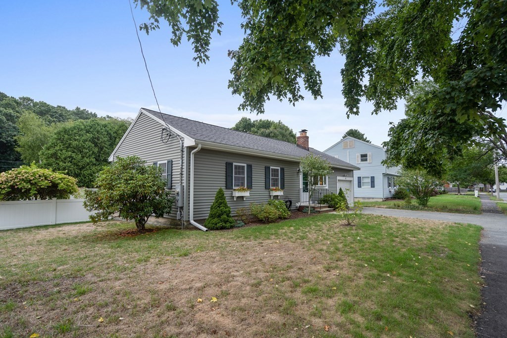 29 Karen Road Wakefield, MA 01880 - Photo 3 of 42 a front view of a house with garden