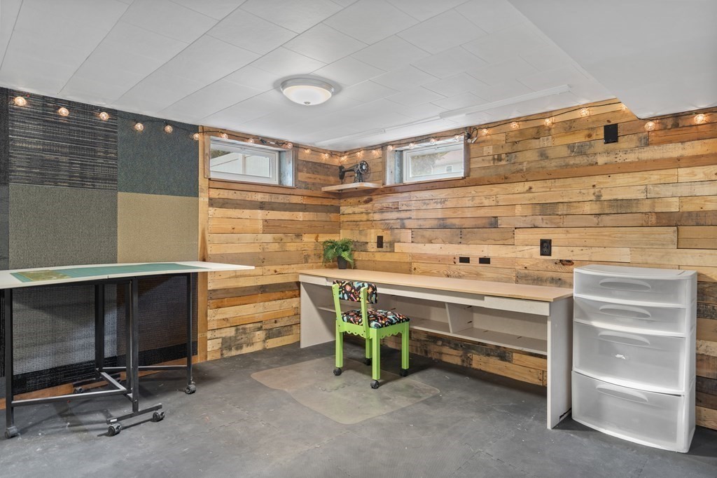 29 Karen Road Wakefield, MA 01880 - Photo 32 of 42 a view of room with a chair and a fireplace