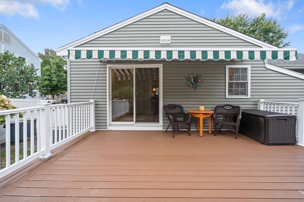 29 Karen Road Wakefield, MA 01880 - Photo 37 of 42 a backyard of a house with table and chairs