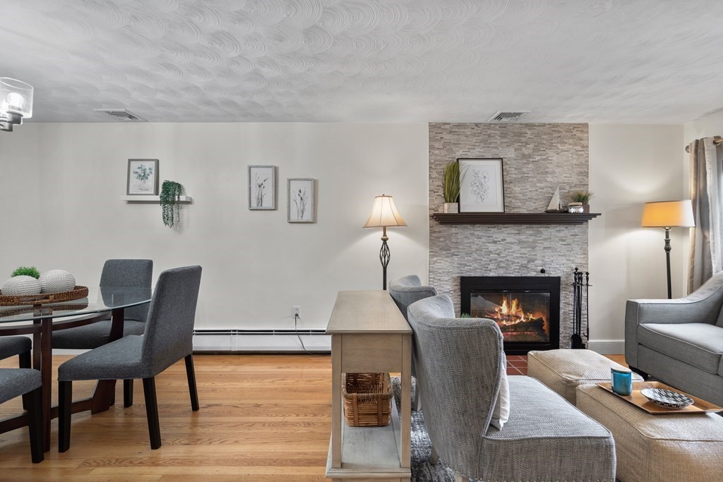 29 Karen Road Wakefield, MA 01880 - Photo 6 of 42 a living room with furniture and a fireplace