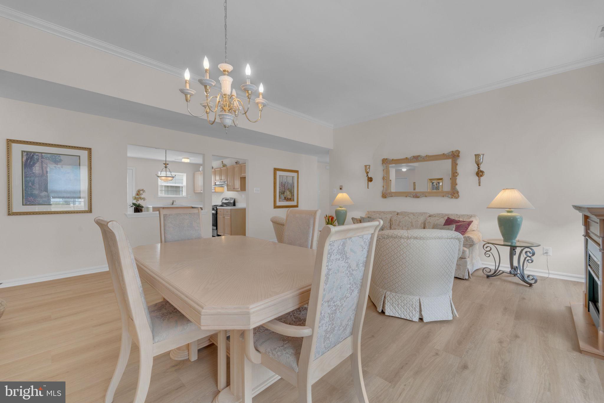 801 Freeport Way Williamstown, NJ 08094 - Photo 12 of 29 a view of a dining room with furniture and wooden floor