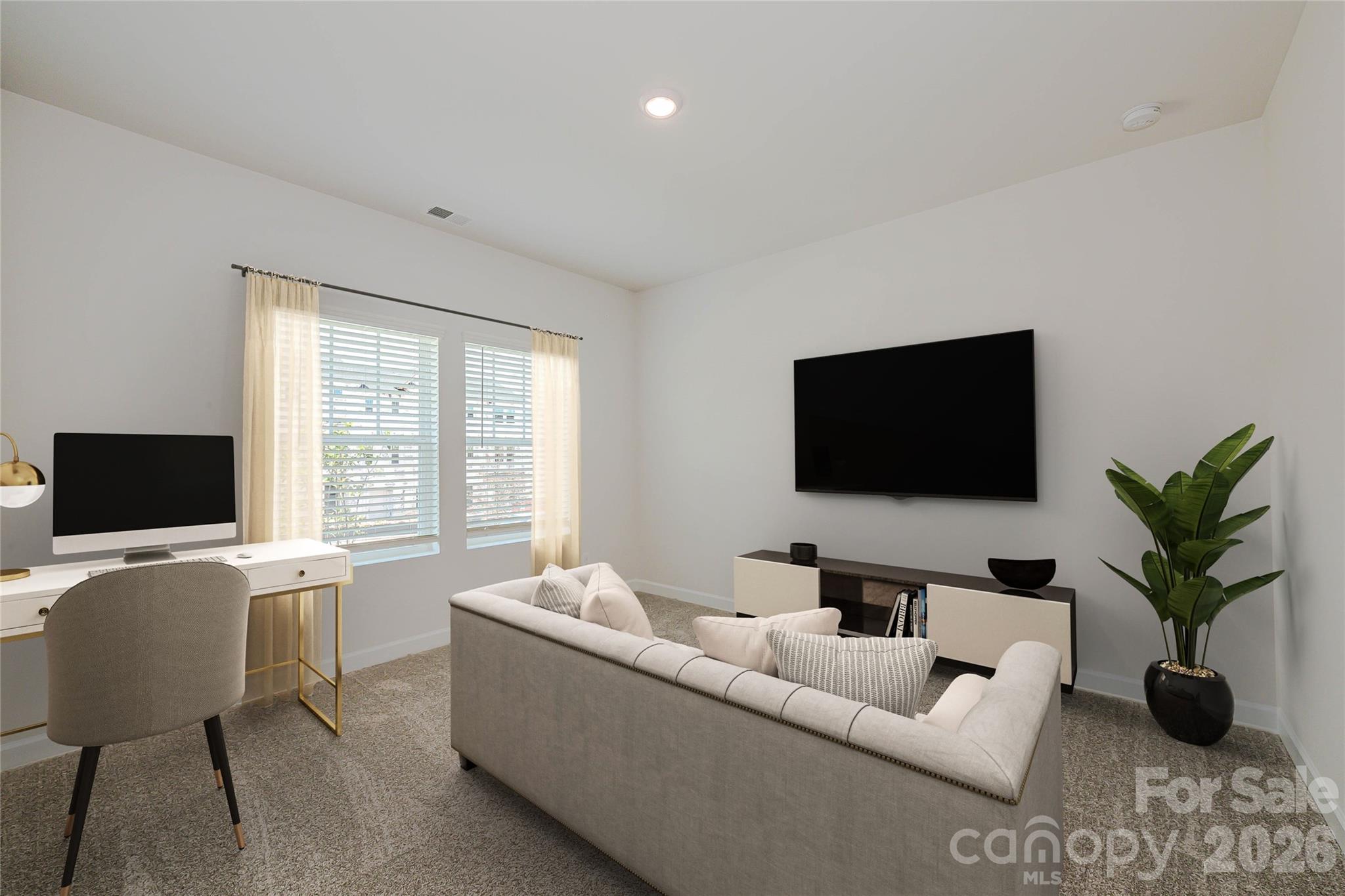 327 Golden Maple Court Fort Mill, SC 29708 - Photo 13 of 18 a living room with furniture and a flat screen tv