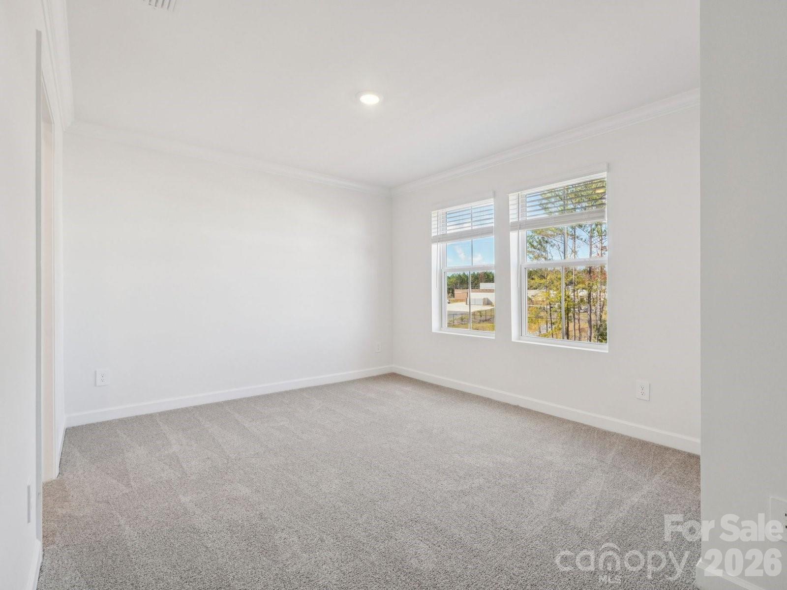 327 Golden Maple Court Fort Mill, SC 29708 - Photo 14 of 18 an empty room with windows