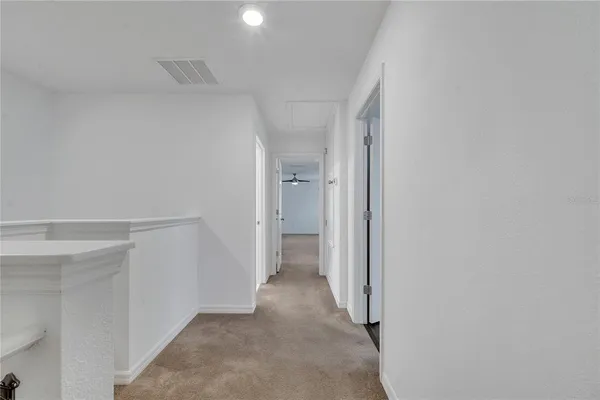 a view of hallway with a hallway