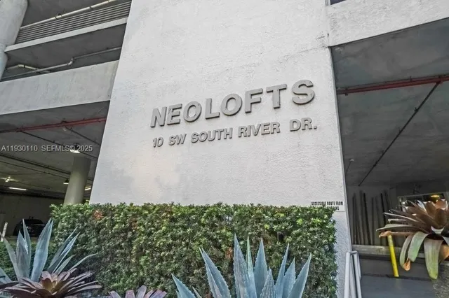 a view of a city with tall buildings