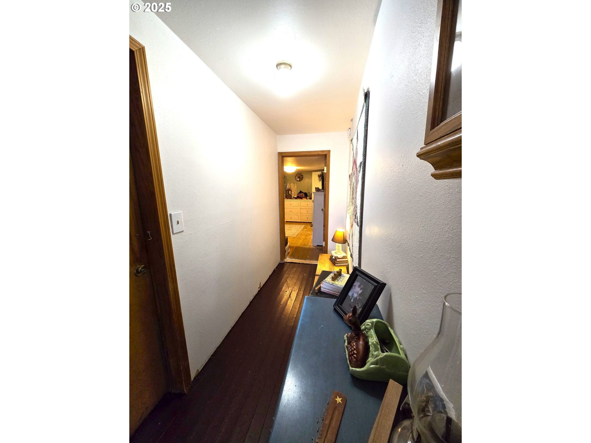 250 2nd Street Long Creek, OR 97856 - Photo 18 of 25 a view of a hallway with workspace