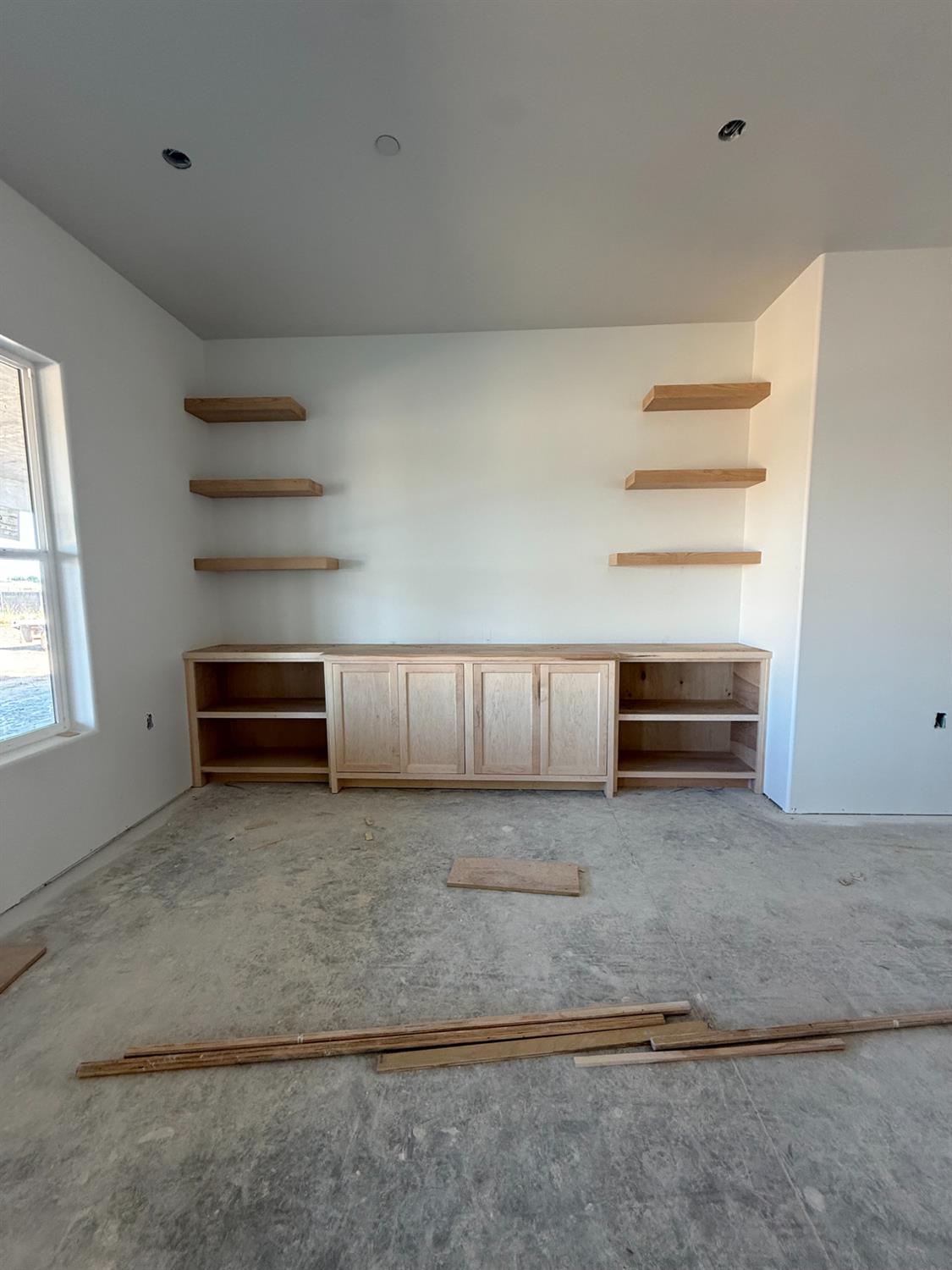 21250 Del Monte Road Madera, CA 93638 - Photo 9 of 17 a view of a storage and utility room with empty racks