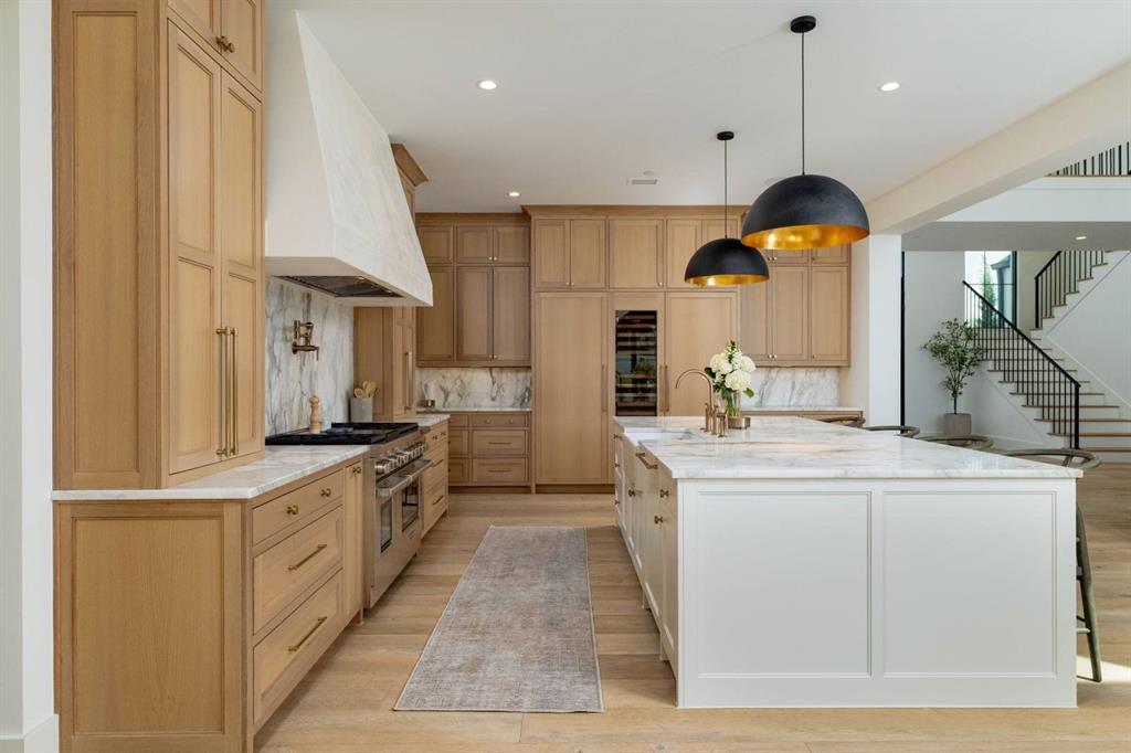 1412 Chelsea Rae Lane Keller, TX 76262 - Photo 9 of 40 The white oak cabinets are the star of this kitchen!