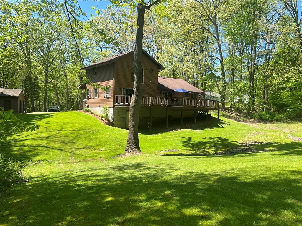 121 Pitts Road Jamestown, PA 16134 - Photo 4 of 28 a view of a house with a yard