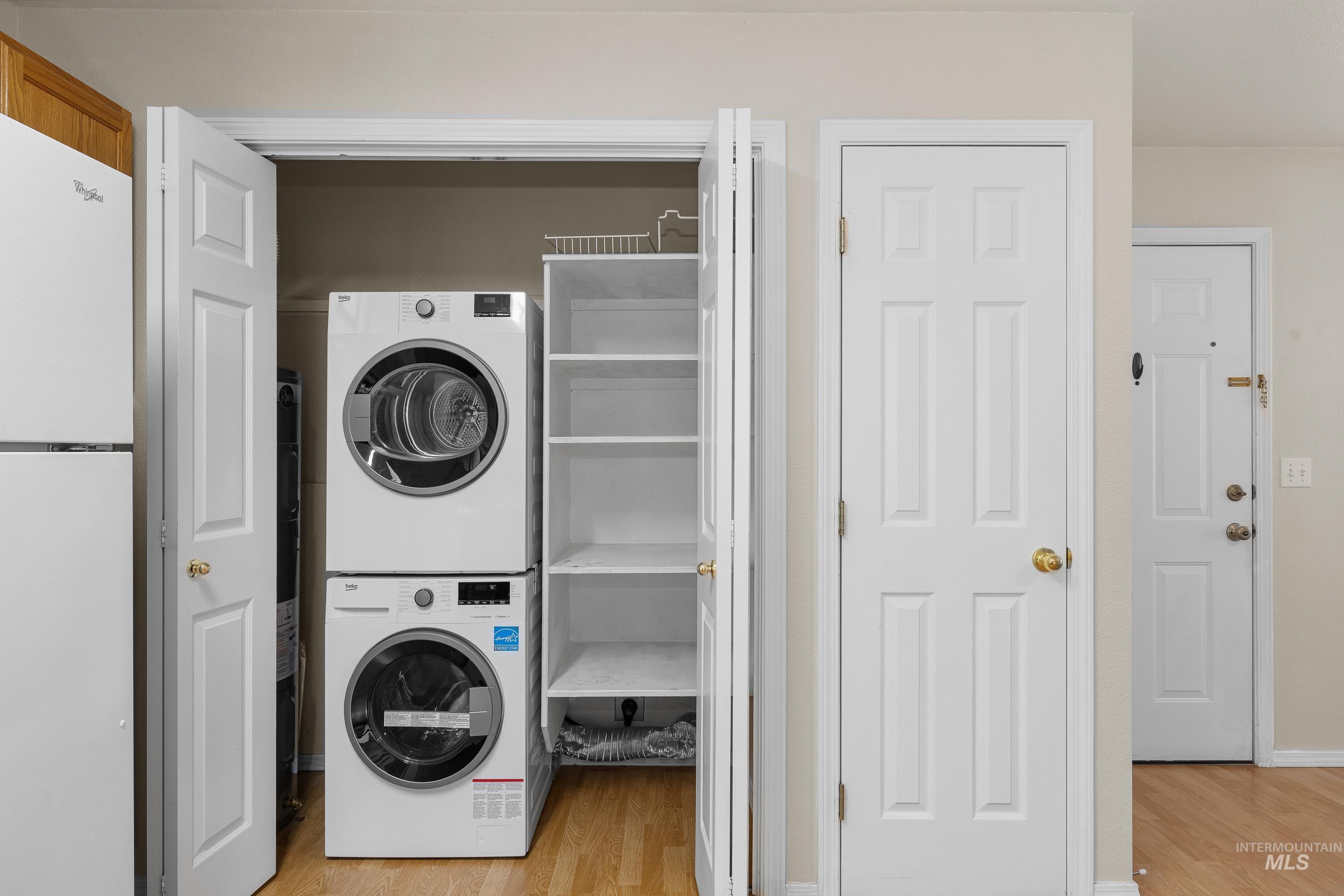 8909 West Irving Street, Unit 101 Boise, ID 83704 - Photo 14 of 33 Stacked washing machine and dryer