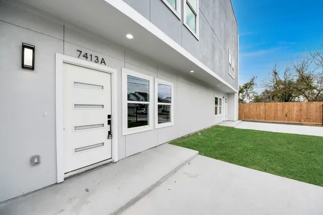 a view of a house with a garage