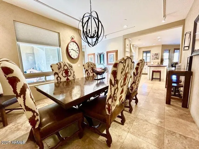 a view of a yard with wooden fence