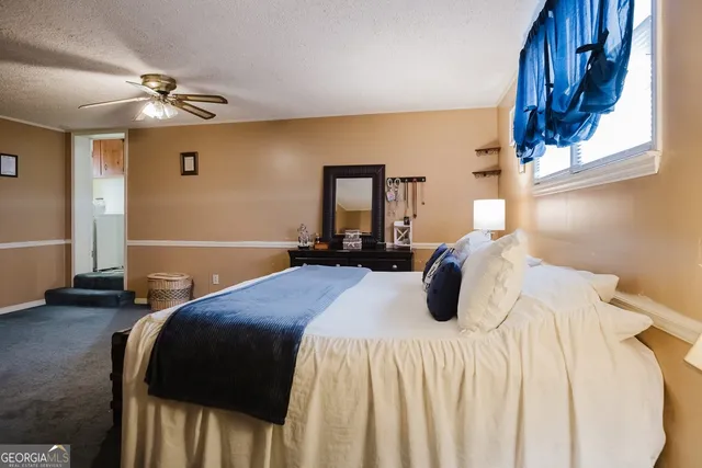 a bathroom with a sink vanity and a mirror