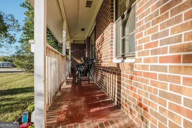 a view of a door with a potted plant
