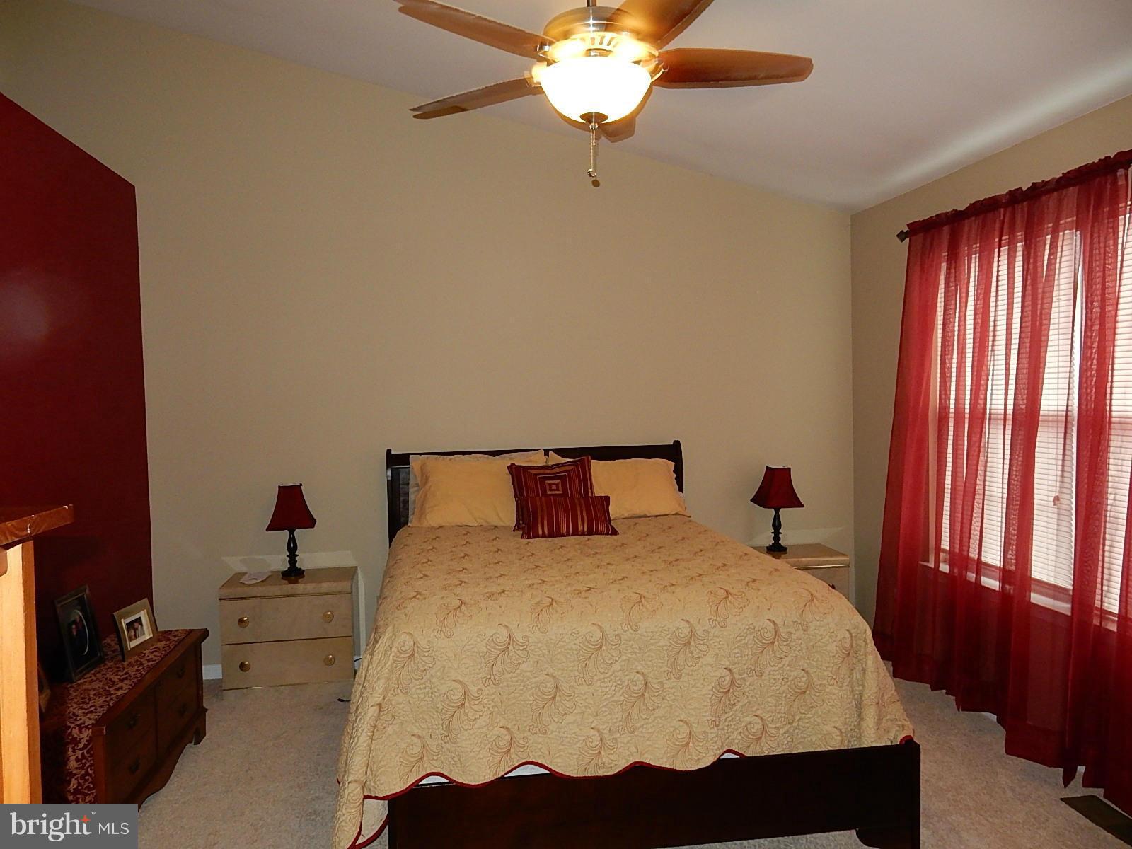 325 Millbrook Terrace Leesburg, VA 20176 - Photo 12 of 20 a bedroom with a bed and window