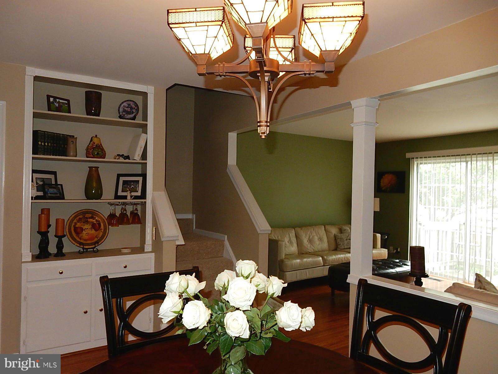 325 Millbrook Terrace Leesburg, VA 20176 - Photo 8 of 20 a living room with hard wood flooring and a couch