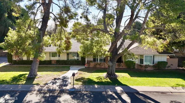 a view of a house with swimming pool