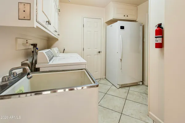 a bathroom with a sink and a shower