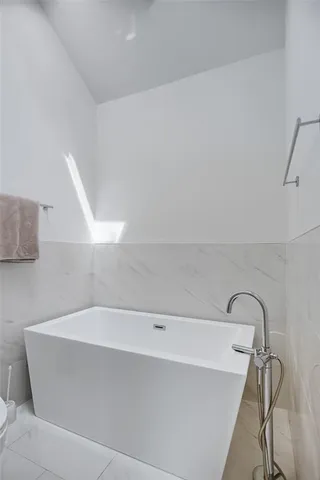 a bathroom with a bathtub