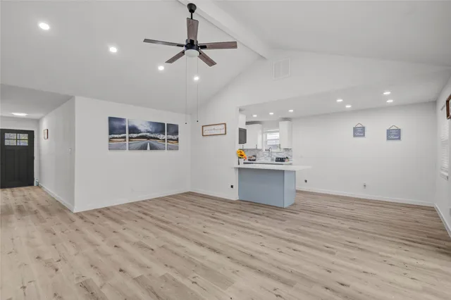 a view of kitchen and windows