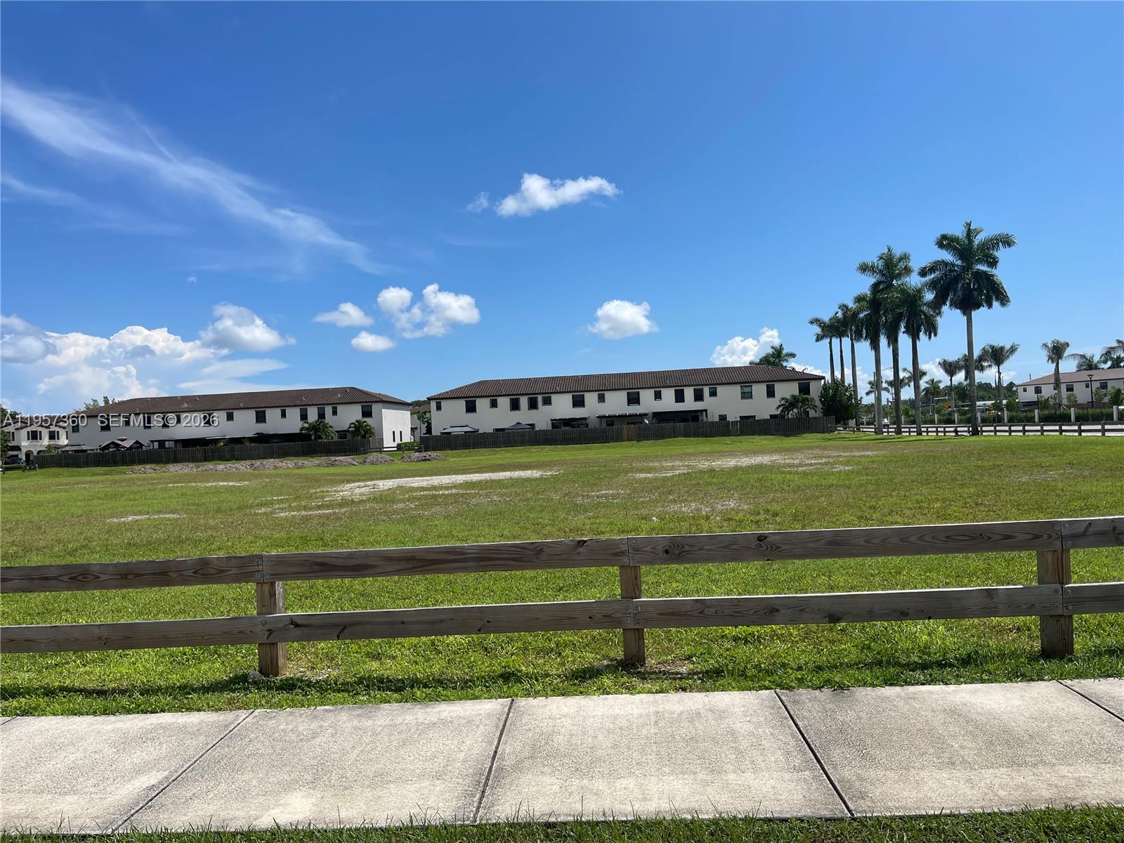 23153 Southwest 128th Place Miami, FL 33177 - Photo 20 of 22 a view of a house with a big yard