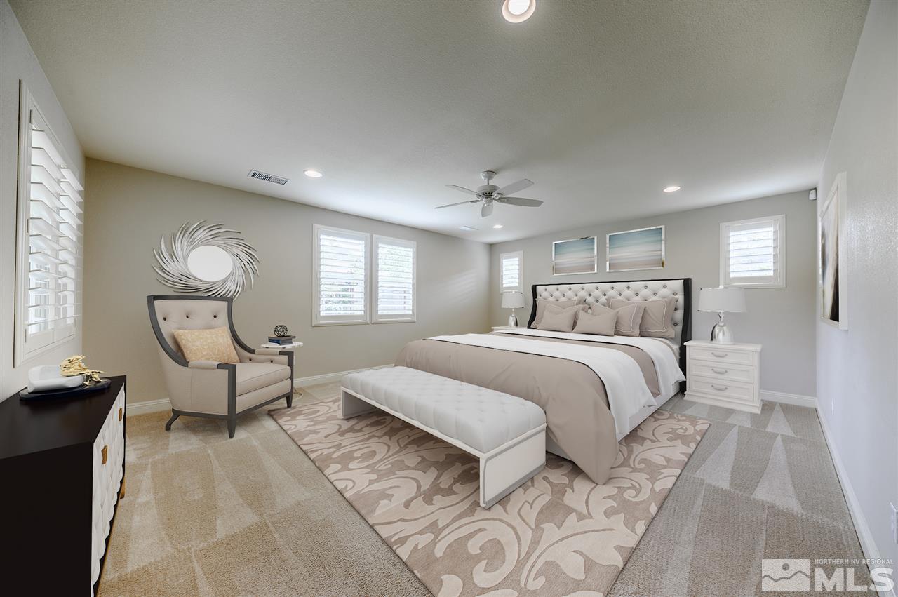 9880 Kerrydale Court Reno, NV 89521 - Photo 5 of 20 a bedroom with a large bed and windows
