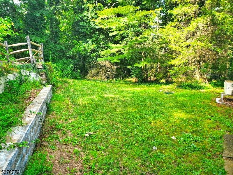 4 Village Place Oak Ridge, NJ 07438 - Photo 13 of 15 a view of yard with green space