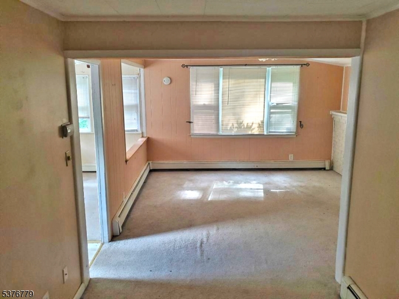 4 Village Place Oak Ridge, NJ 07438 - Photo 4 of 15 a view of room with window and stairs