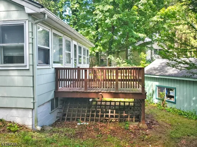 a view of a house with a deck