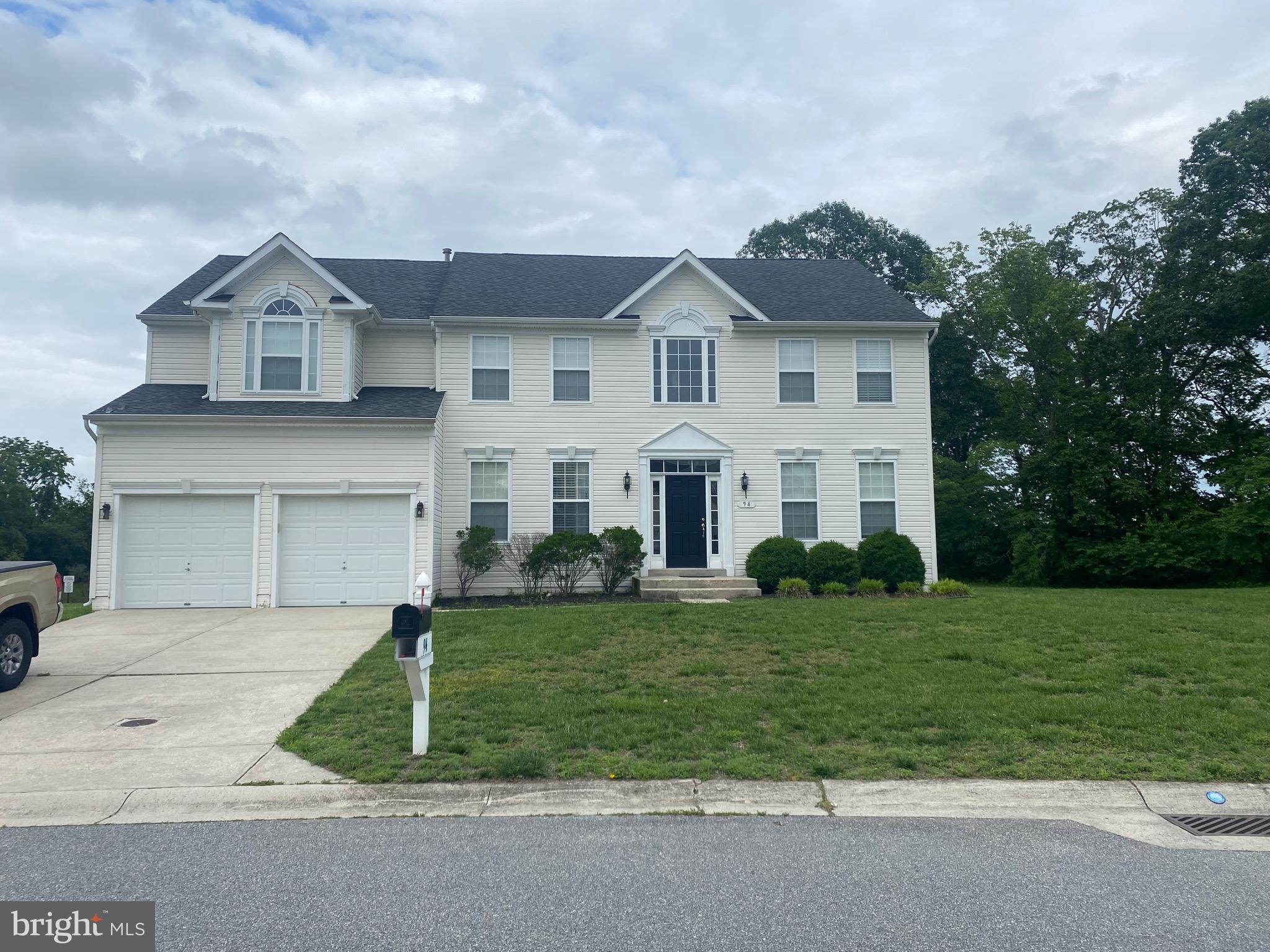 94 Rydal Circle Magnolia, DE 19962 - Photo 1 of 23 a front view of a house with a yard