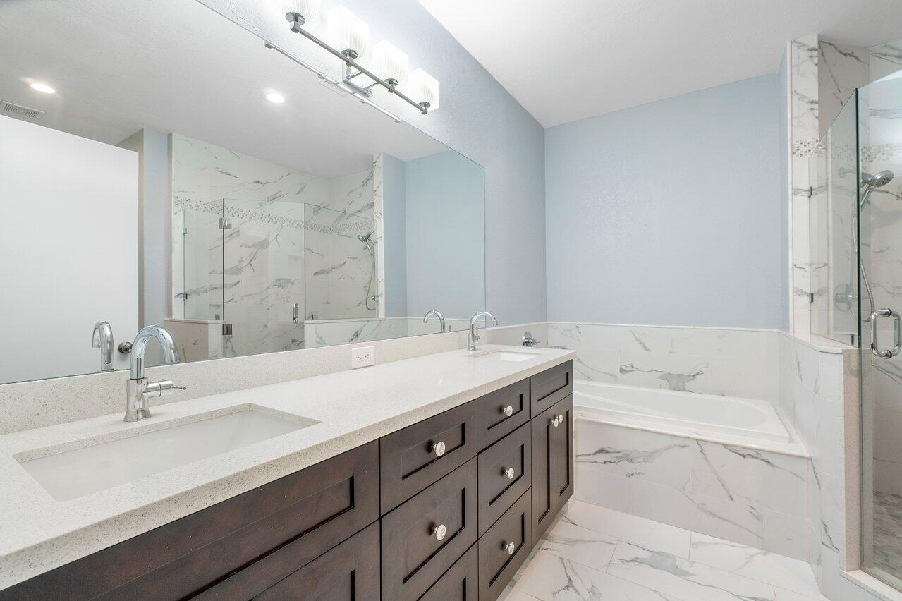 6721 Montego Bay Boulevard, Unit E Boca Raton, FL 33433 - Photo 19 of 37 PRIMARY BATHROOM VIEW 1