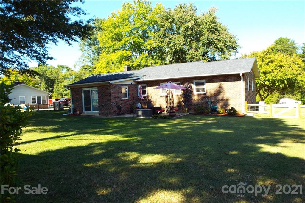 7905 Barkley Road Sherrills Ford, NC 28673 - Photo 24 of 31 a view of a house with a backyard