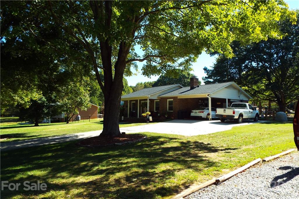 7905 Barkley Road Sherrills Ford, NC 28673 - Photo 27 of 31 a front view of a house with a yard