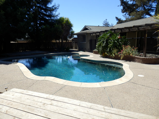 3360 Canada Road Gilroy, CA 95020 - Photo 19 of 23 a view of a swimming pool with potted plants