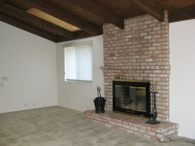 3360 Canada Road Gilroy, CA 95020 - Photo 6 of 23 a living room with a fireplace